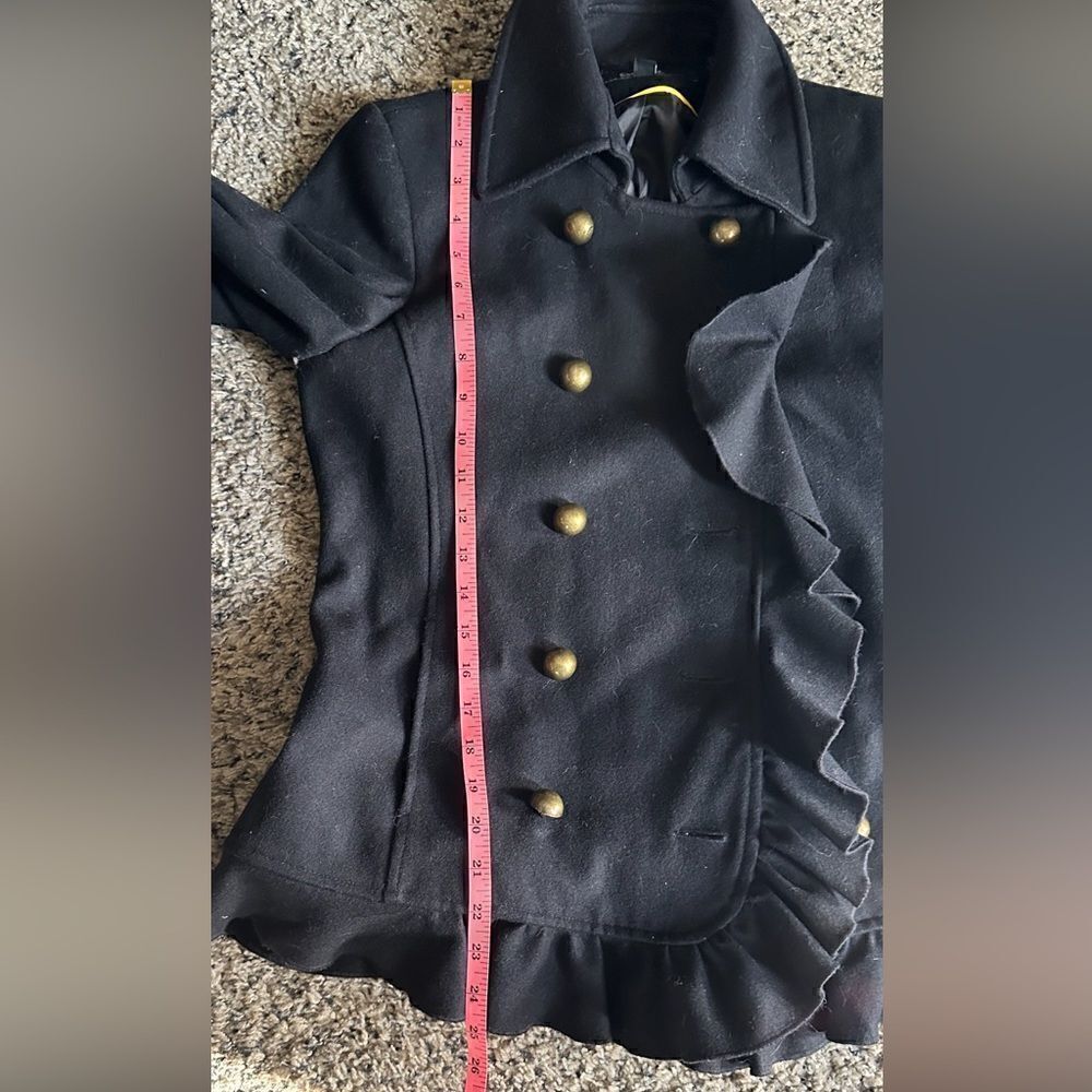 DKNY Wool coat with ruffled trim, pockets and oversized buttons.Size 2 - Picture 7 of 13